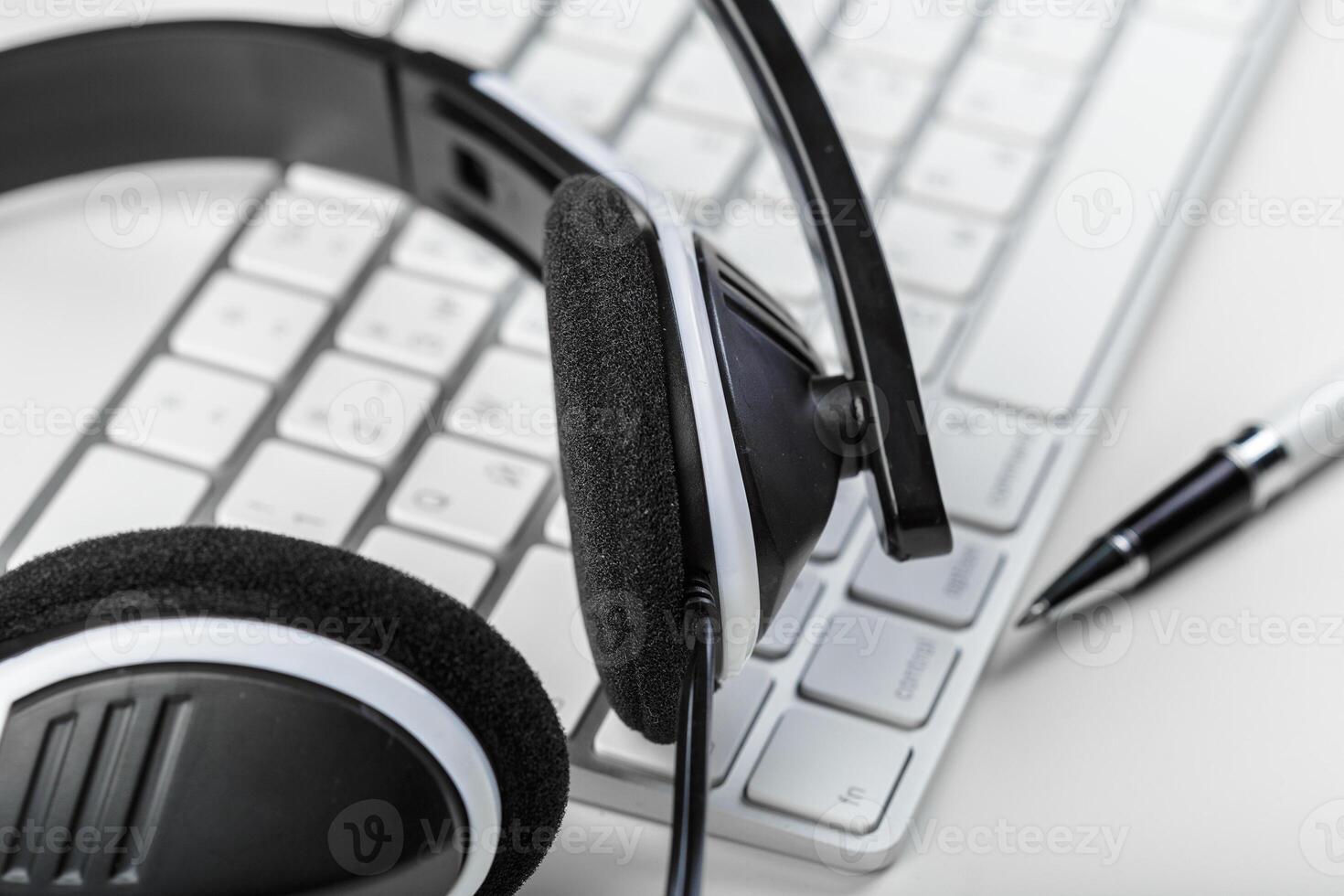 headset on keyboard computer laptop photo
