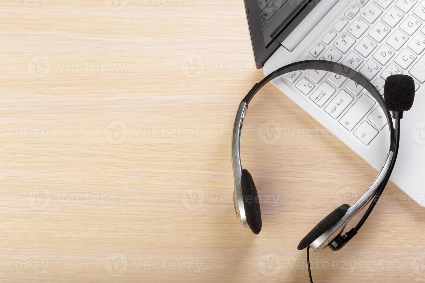 headset on keyboard computer laptop photo