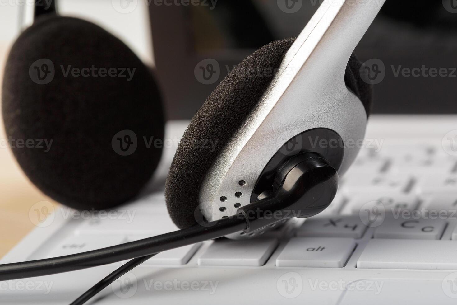 headset on keyboard computer laptop photo