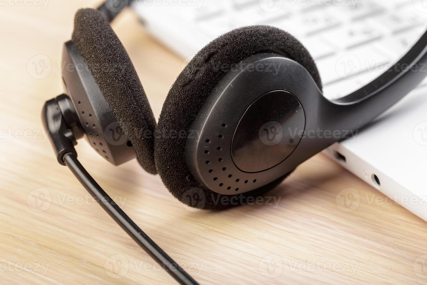 headset on keyboard computer laptop photo