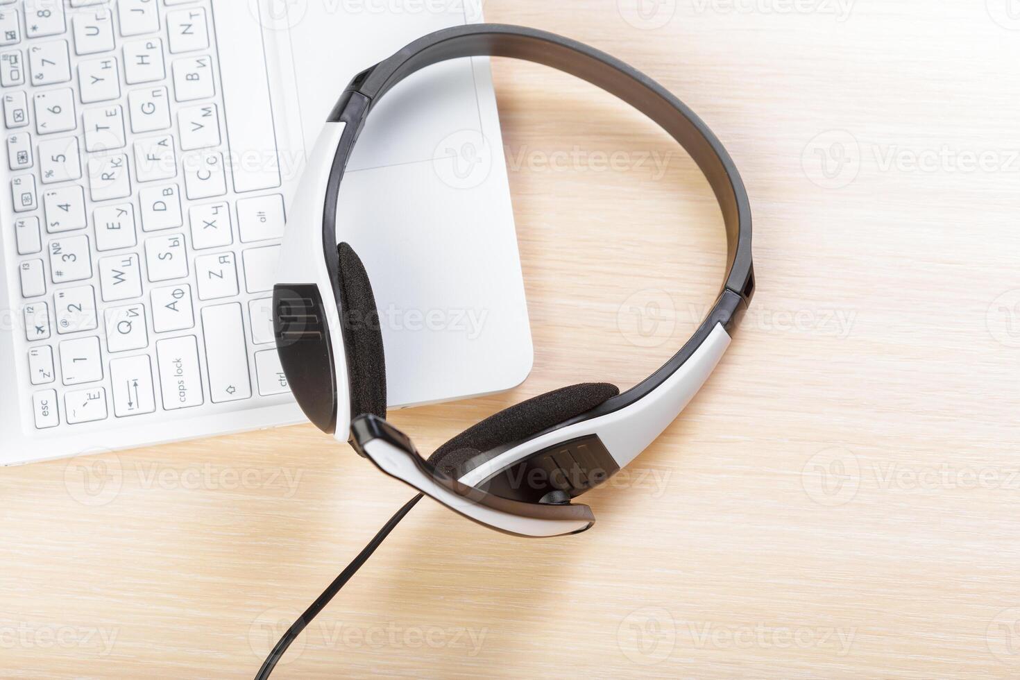 headset on keyboard computer laptop photo