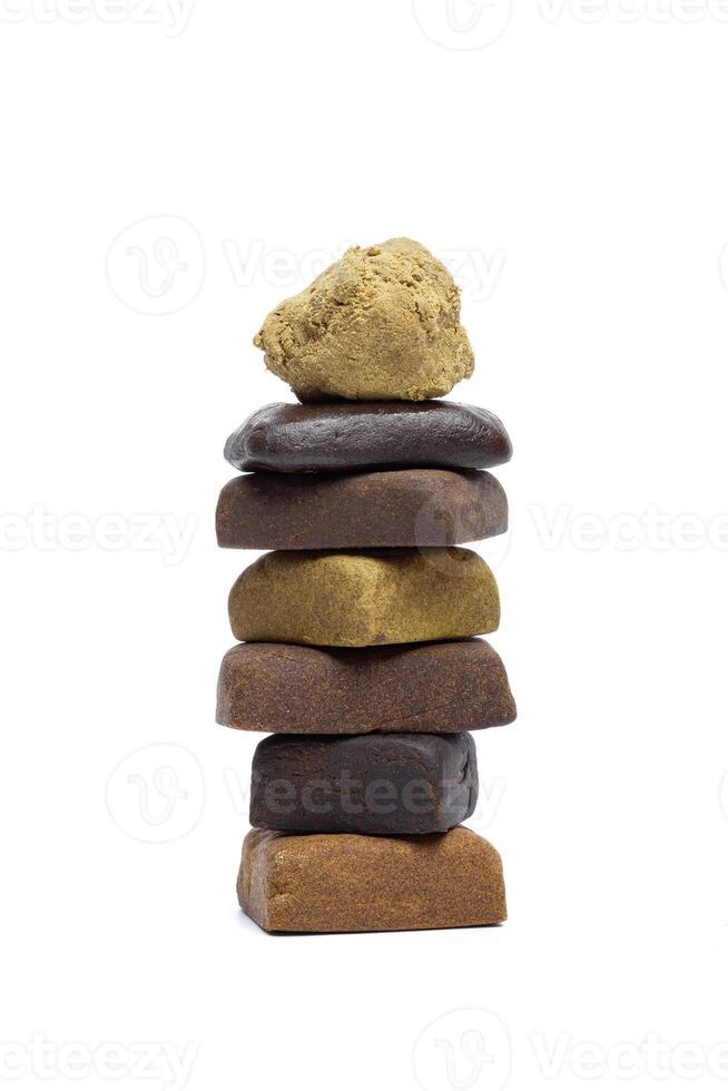 Blocks of hashish isolated on white background photo