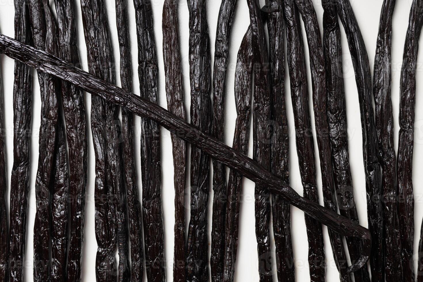 Vanilla beans on white background photo