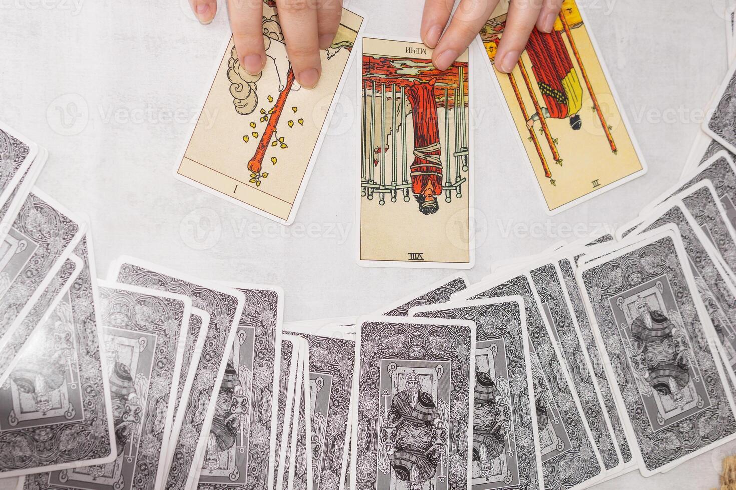 TVER, RUSSIA - FEBRUARY 18, 2024. Tarot cards, Tarot card divination, fortune telling. Occultism, esoteric education. photo