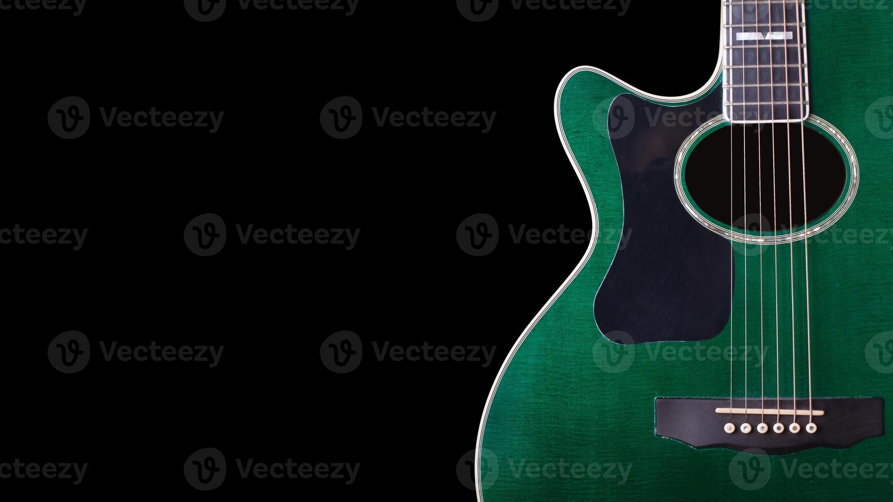 Green Acoustic Guitar on Black Background photo
