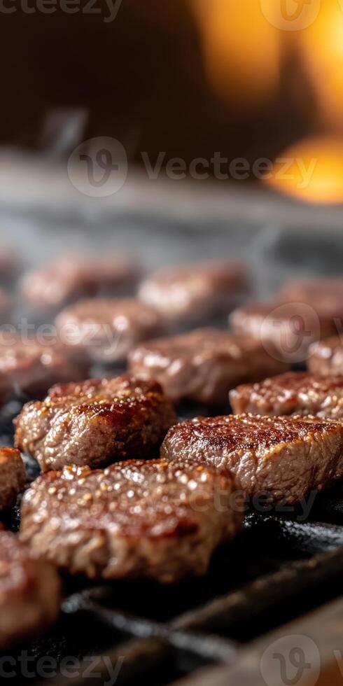 Grilling beef steaks to perfection over hot coals in a backyard setting photo