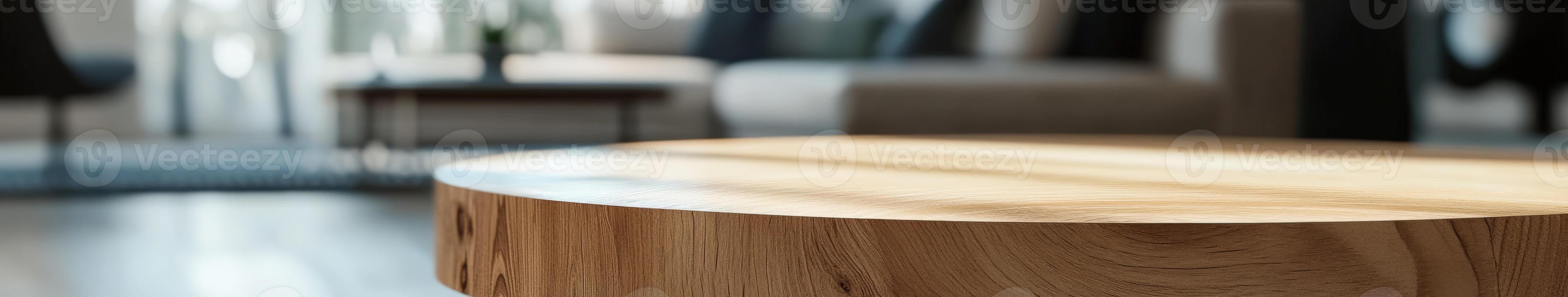 Wooden table in a modern living room with soft natural lighting photo