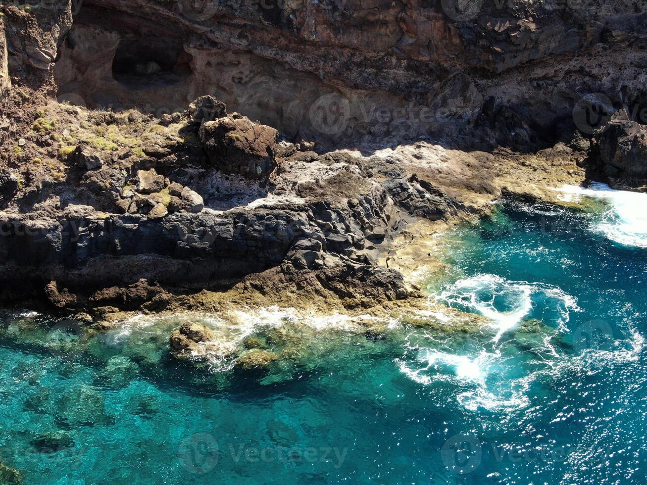 Ocean coast, rocks near Canical on the Madeira photo