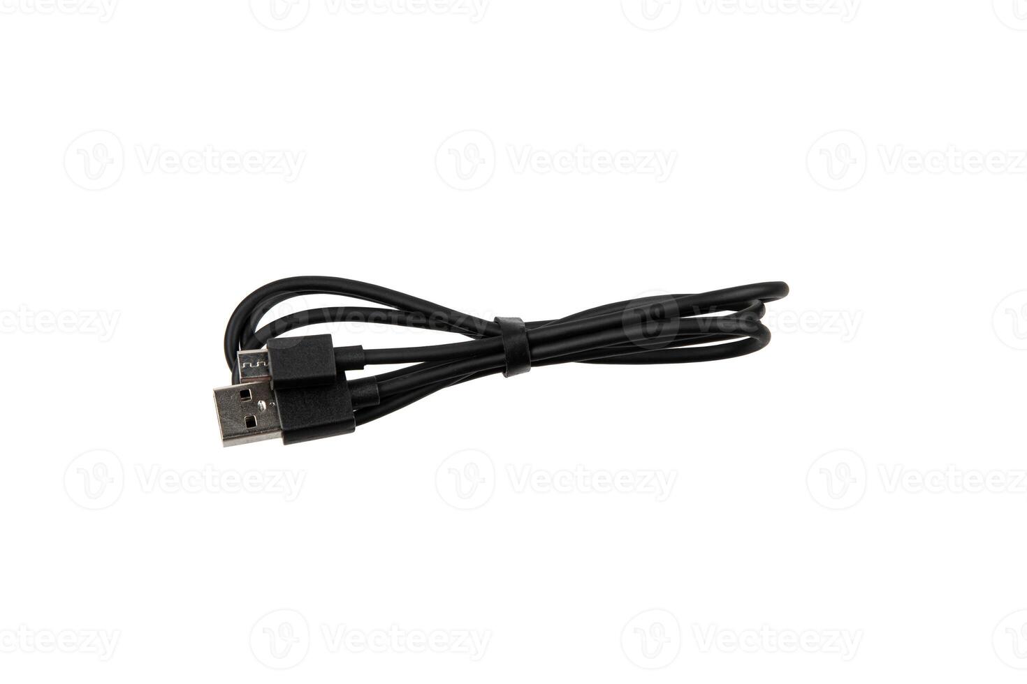 Black USB cable with two connectors, neatly coiled and secured with a strap, isolated on a white background. photo