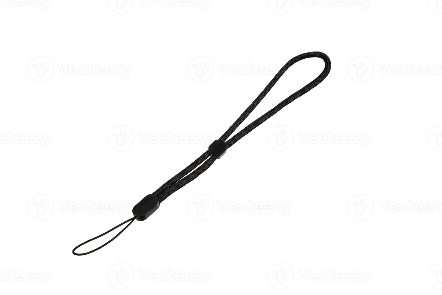 A black wrist strap with an adjustable loop, commonly used for securing small electronic devices like cameras or USB drives, isolated on a white back. photo
