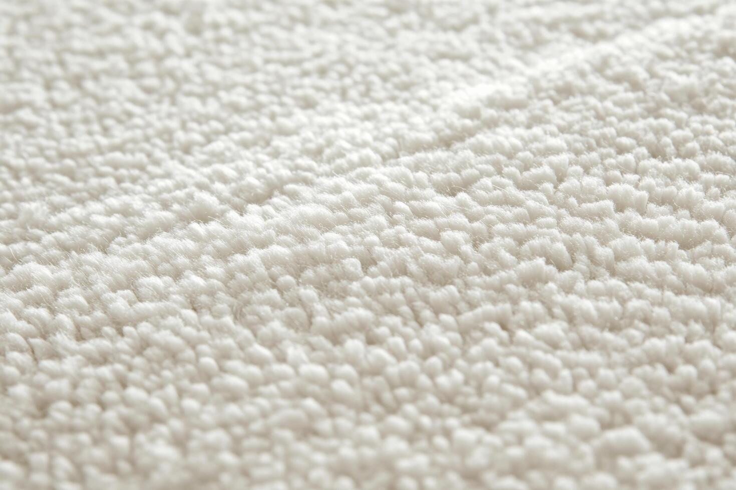 The image is of a white carpet with a fuzzy texture photo