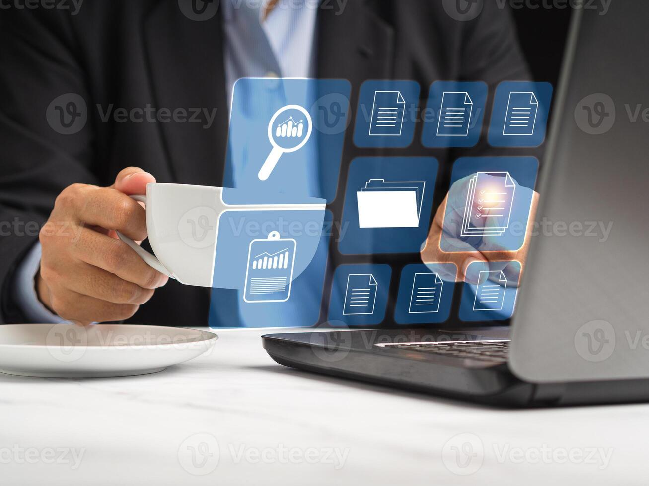 Businessman reading digital documents on a virtual screen photo