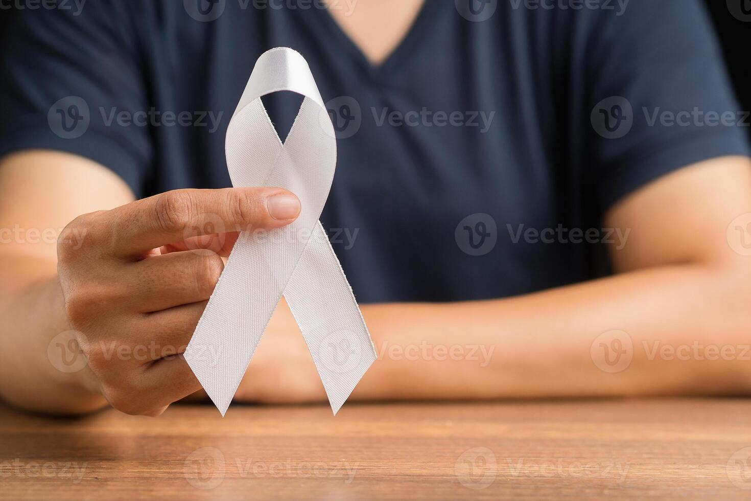 White ribbon symbol the fight against lung cancer photo