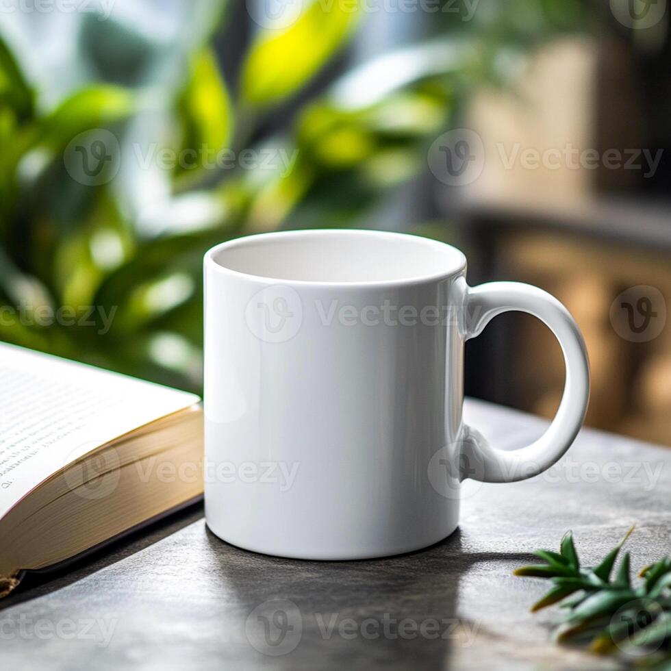 A white mug sits on top of an open book photo