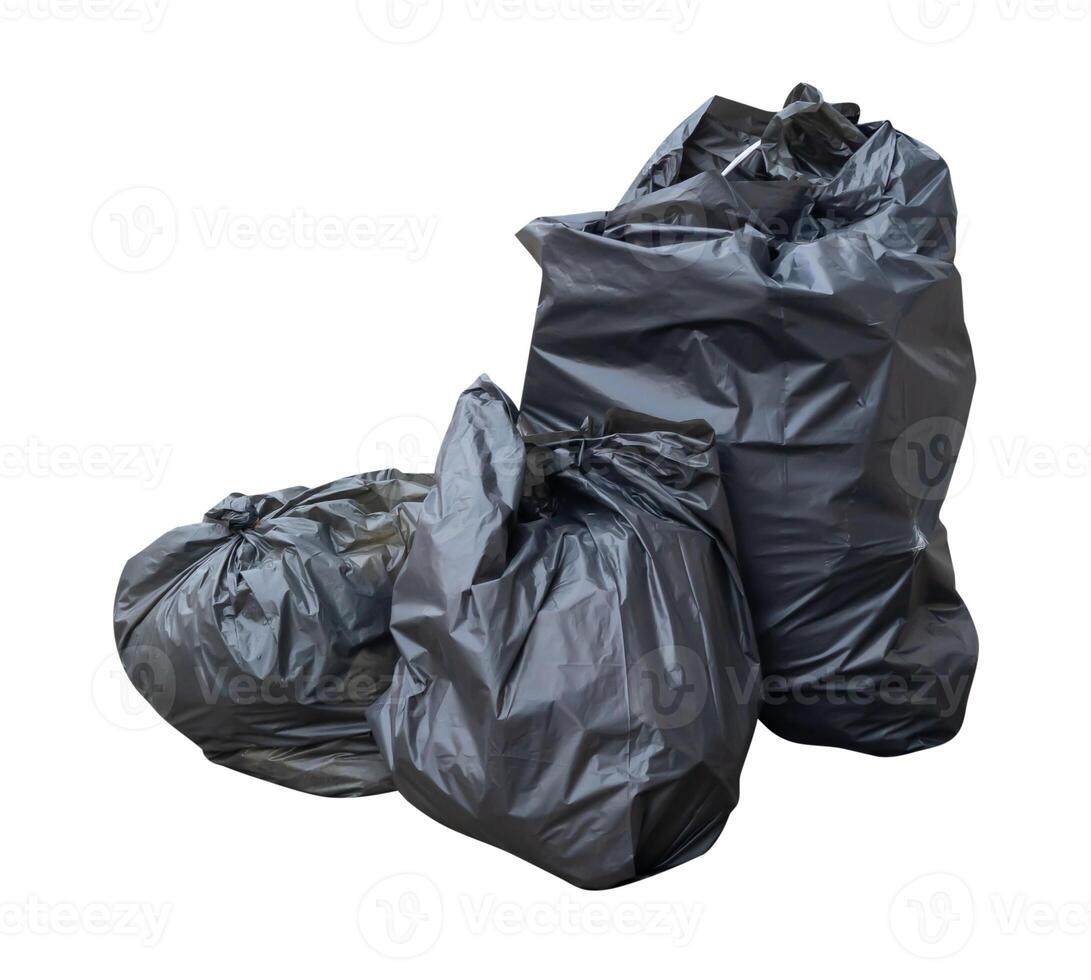Front view of garbage in black plastic bag at garbage dump isolated on white background with clipping path photo