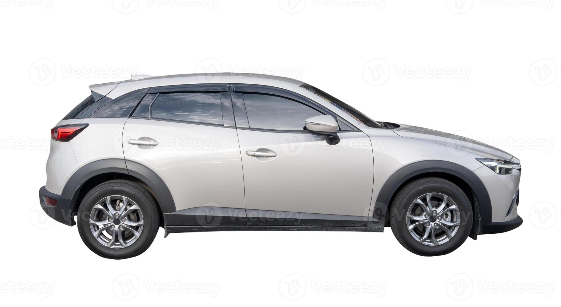 Side view of silver hatchback car isolated on white background with clipping path photo