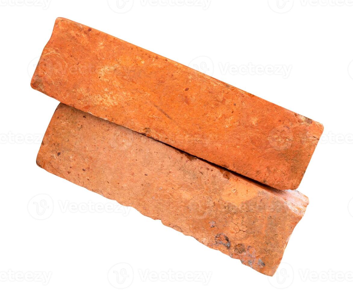 Top view of old red or orange bricks in stack isolated on white background with clipping path photo
