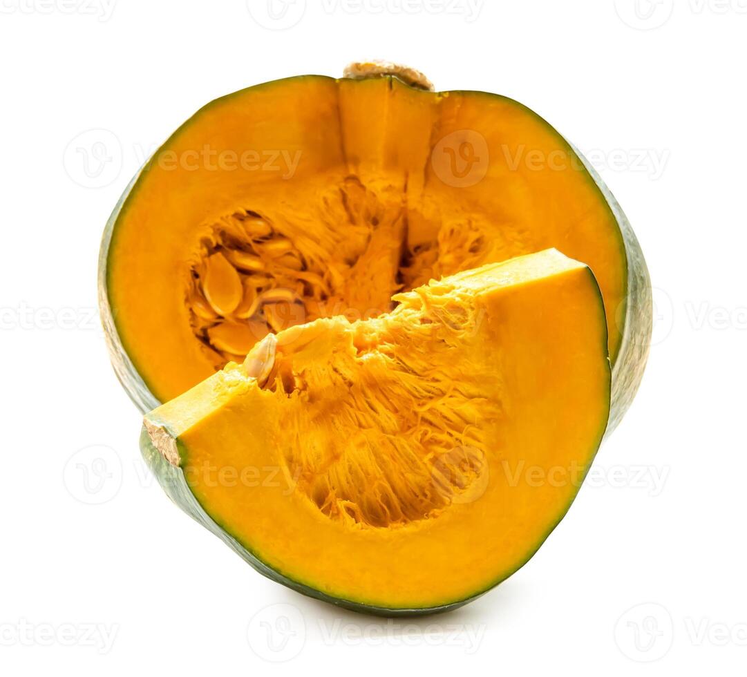 Side view of fresh green japanese pumpkin with slices or pieces in stack isolated on white background with clipping path photo