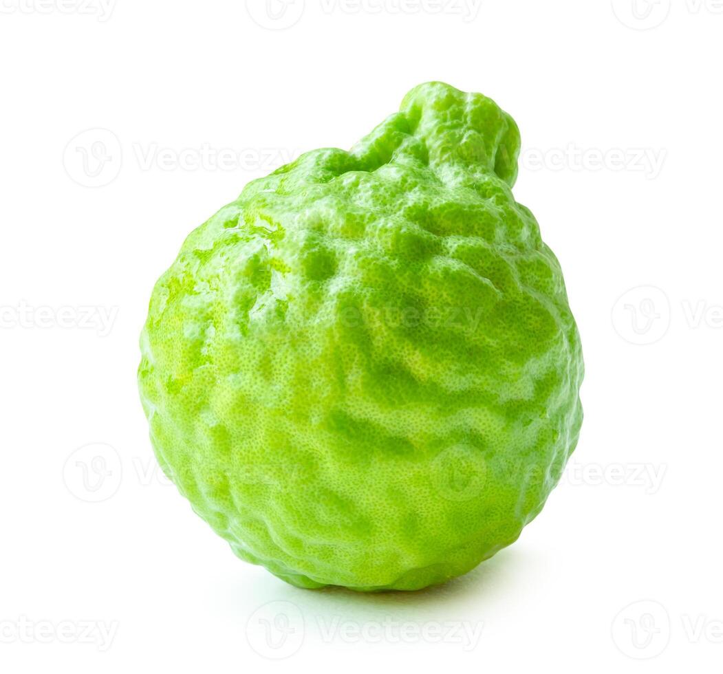 Side view of single fresh bergamot fruit or kaffir lime isolated on white background with clipping path photo