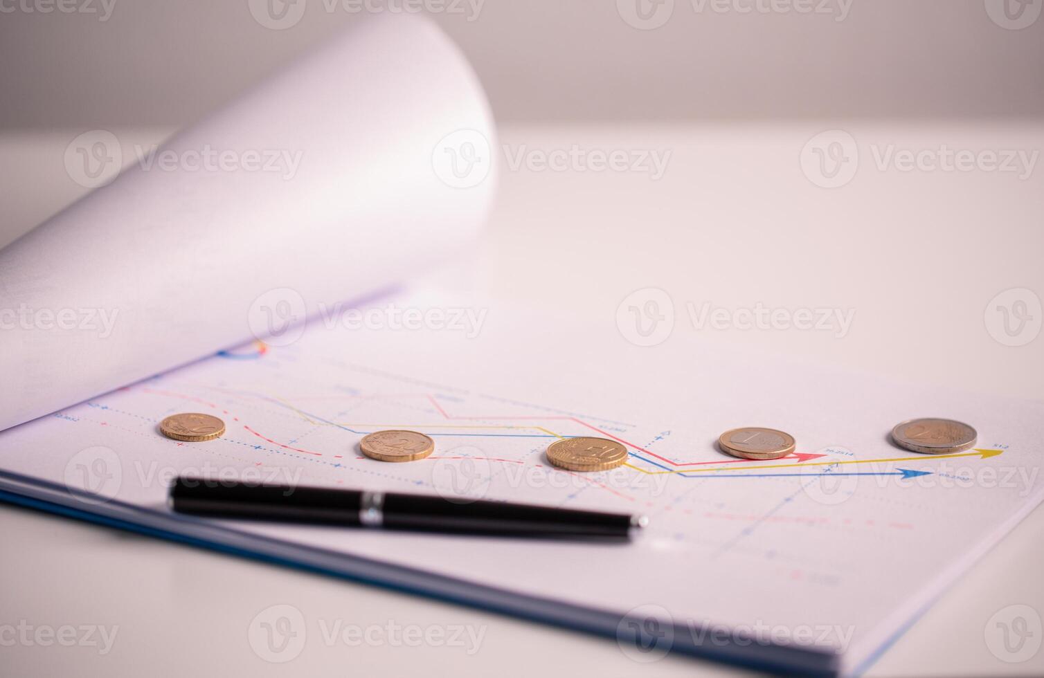 Finance office prepared business report, including an investment document, marketing chart, and an accounting graph, to analyze current state of the economy. credit, inspecting, cash, coin, modern. photo