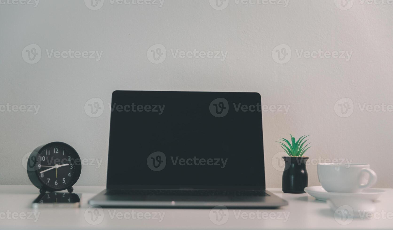 Remote work relies on technology, with employees using laptops and computers from home to communicate and conduct business online via network. comfortable, display, efficient, electronic, minimalist. photo