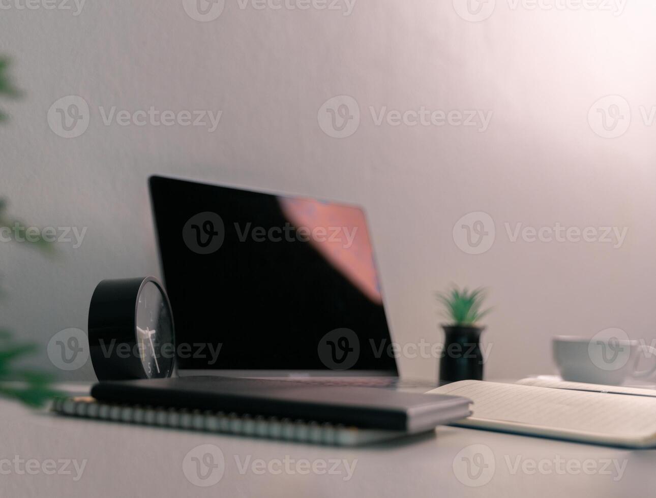 Remote work relies on technology, with employees using laptops and computers from home to communicate and conduct business online via network. comfortable, display, efficient, electronic, minimalist. photo