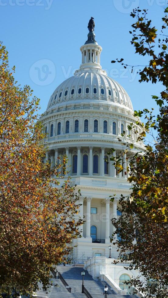The Washington DC city view with the Capitol Hill building as background in autumn photo
