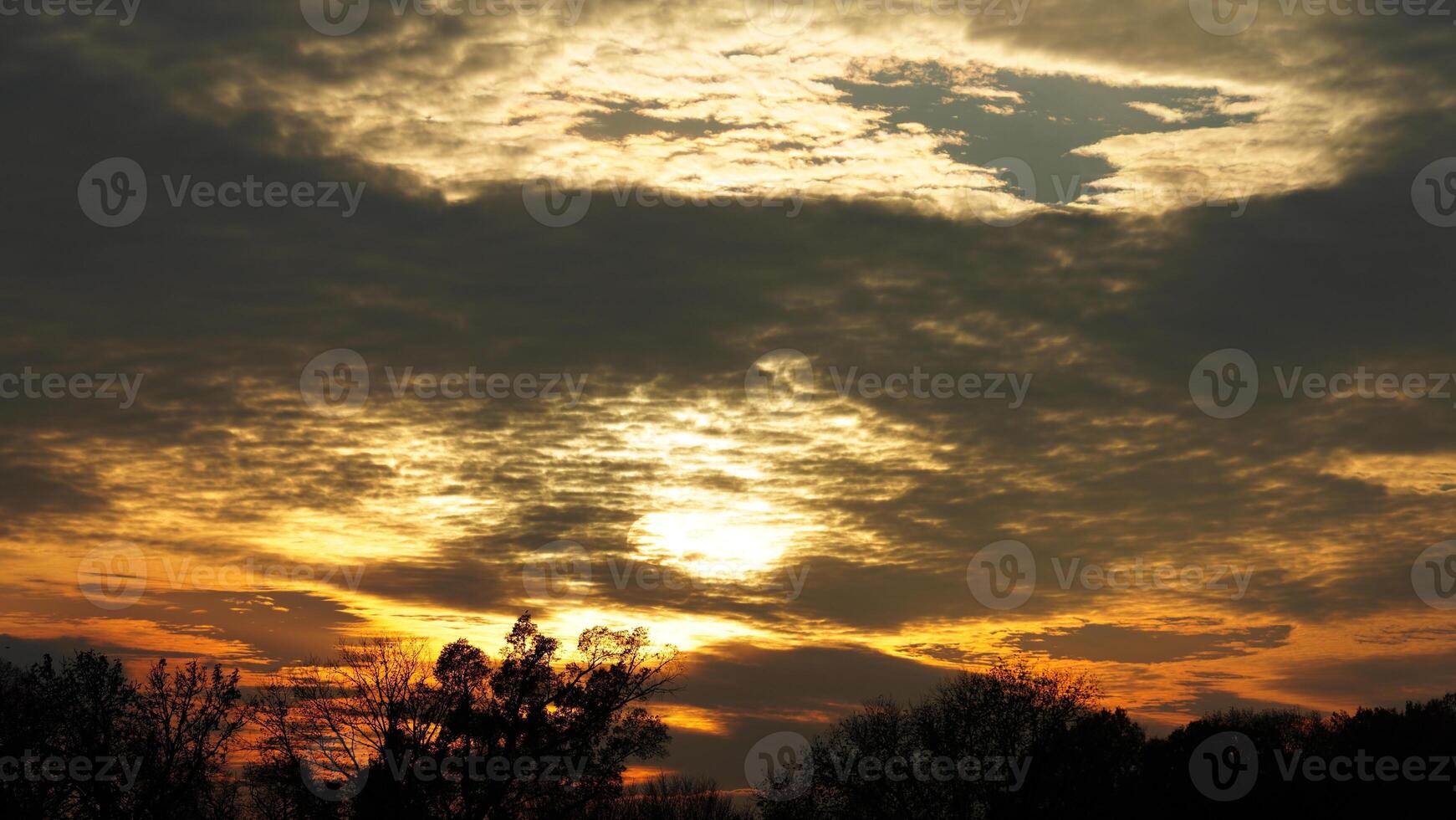The beautiful sunset sky view with the colorful clouds as background photo