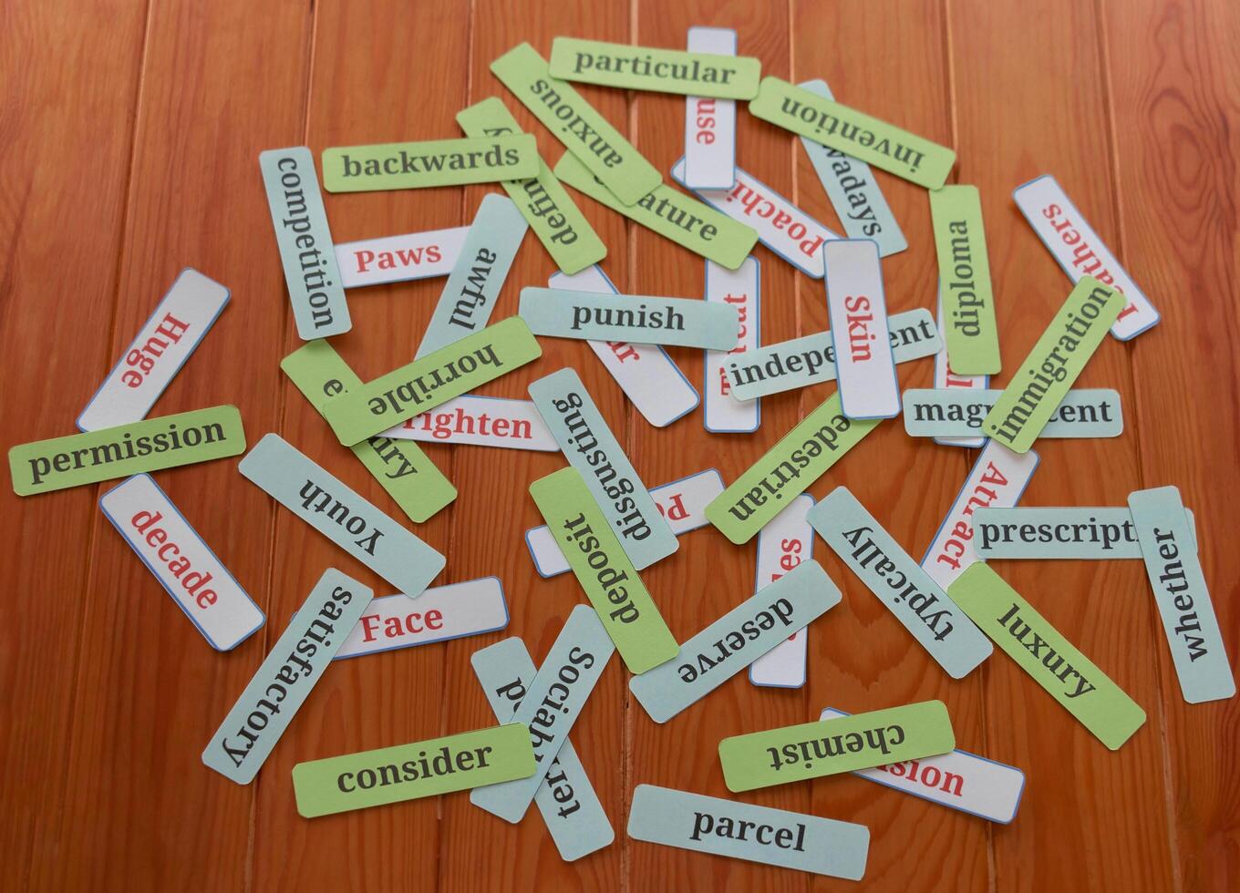 pile of word cards on table photo