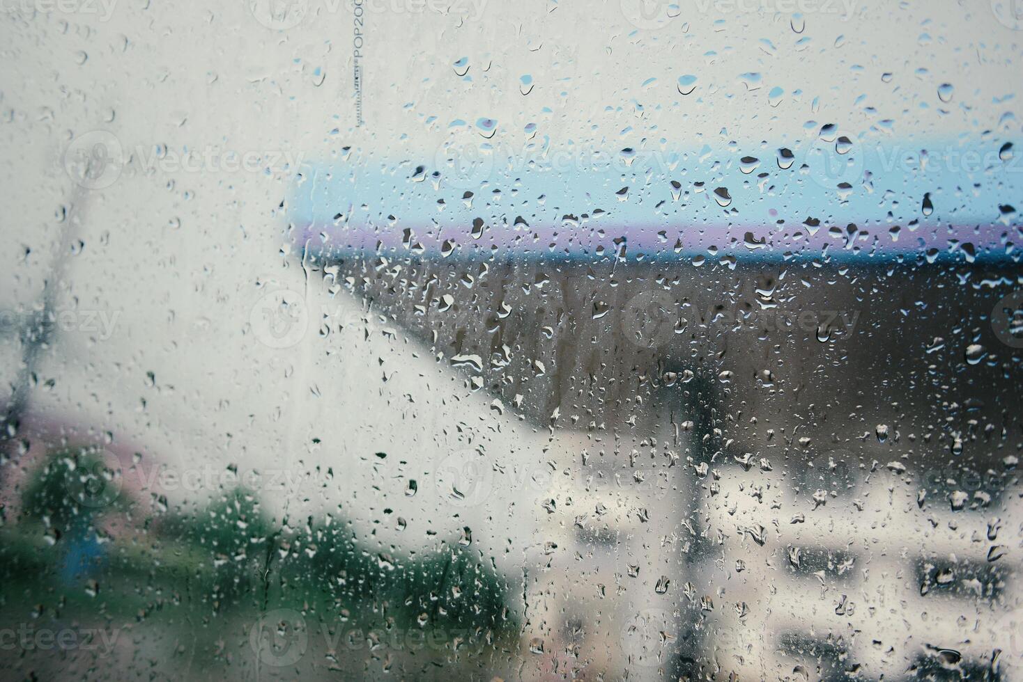 Rain drops on window glasses background photo