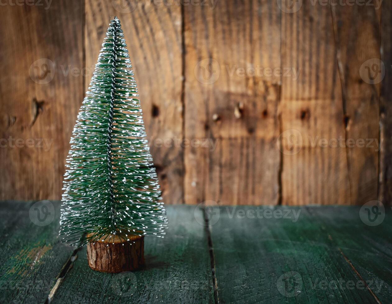 Pine Tree on wooden Background photo