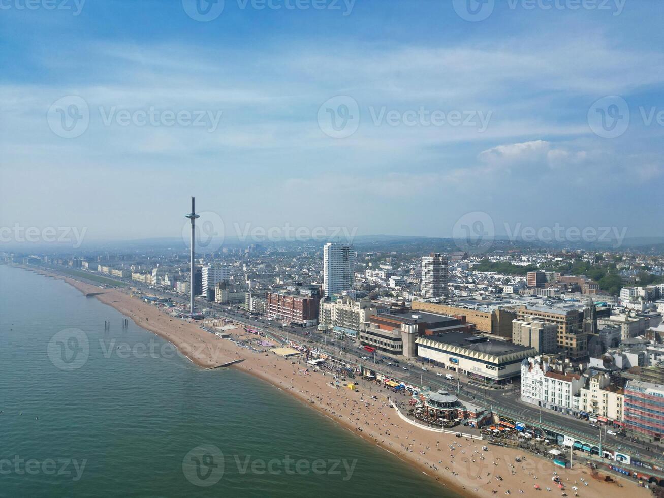 Aerial View of British Tourist Attraction of Beach and Ocean at Brighton and Hove Coastal City of England United Kingdom. High angle Footage of British Tourist Attraction Was Captured on May 9th, 2024 photo