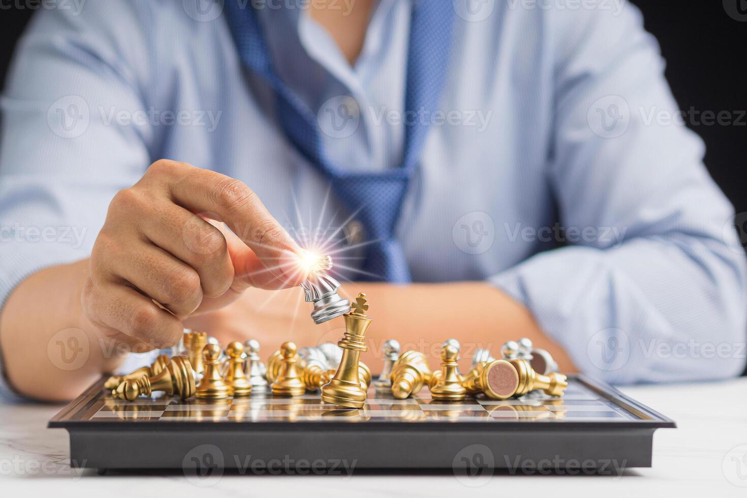 Businessman playing with chess game. Business strategy ideas and investment photo