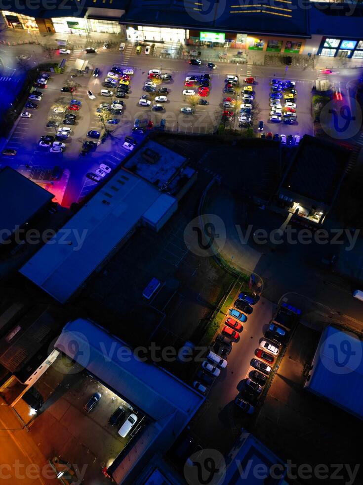 Aerial View of Illuminated Central Cambridge City of Cambridgeshire of England UK During Night. High Angle Footage Was Captured with Drone's Camera at Just After Sunset on March 22nd, 2024 photo