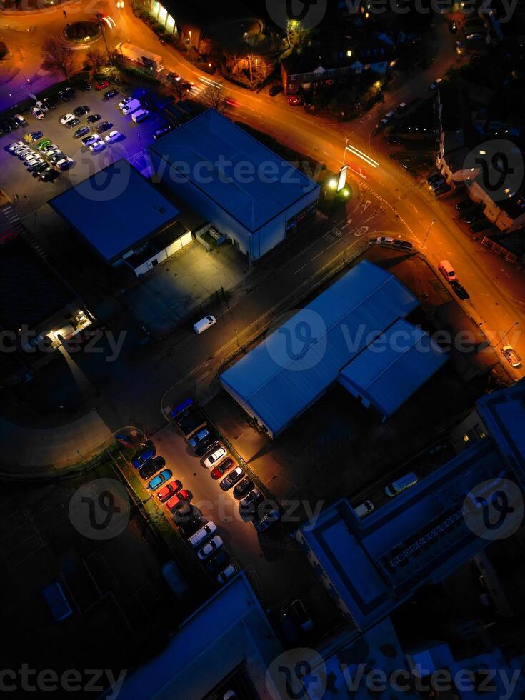 Aerial View of Illuminated Central Cambridge City of Cambridgeshire of England UK During Night. High Angle Footage Was Captured with Drone's Camera at Just After Sunset on March 22nd, 2024 photo