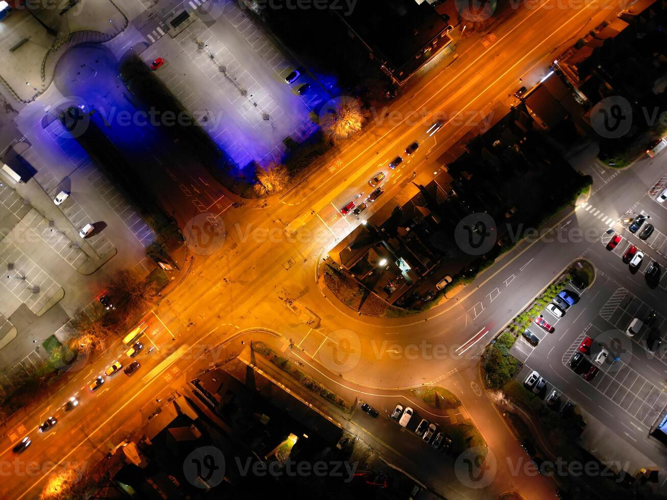 Aerial View of Illuminated Central Cambridge City of Cambridgeshire of England UK During Night. High Angle Footage Was Captured with Drone's Camera at Just After Sunset on March 22nd, 2024 photo