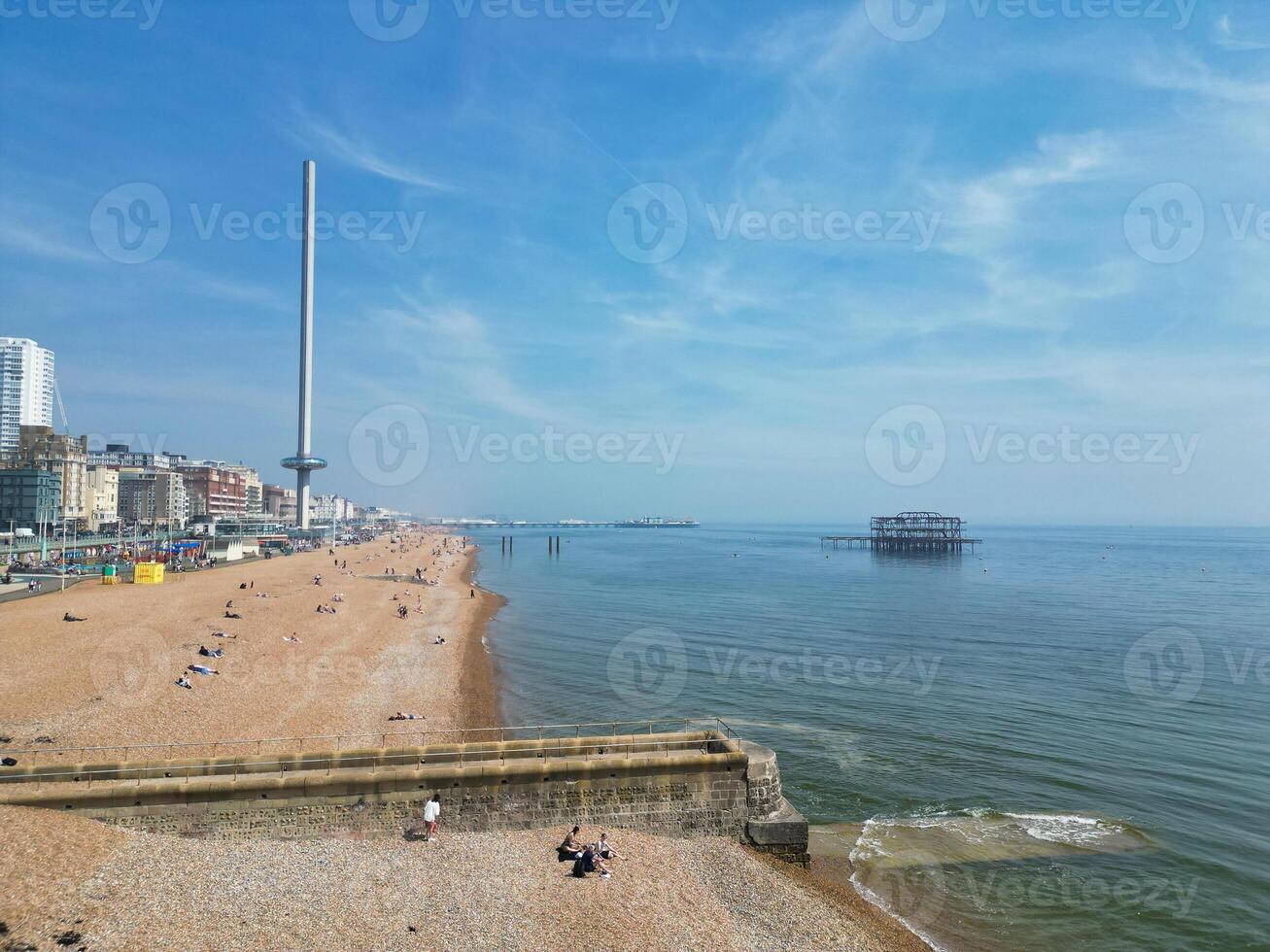 Aerial View of British Tourist Attraction of Beach and Ocean at Brighton and Hove Coastal City of England United Kingdom. High angle Footage of British Tourist Attraction Was Captured on May 9th, 2024 photo