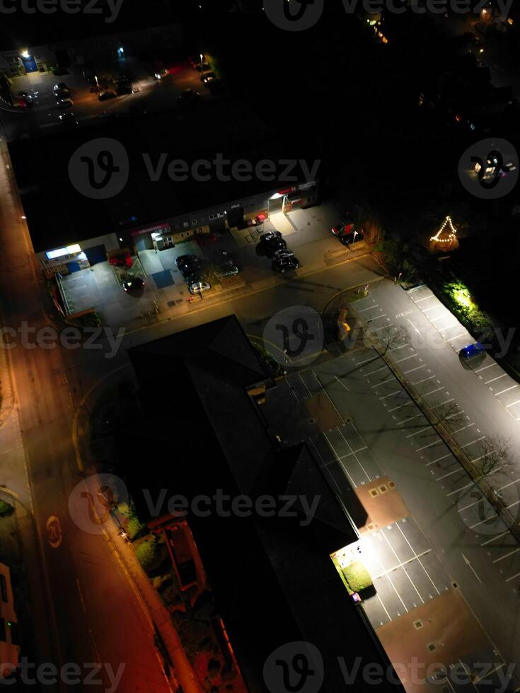 Aerial View of Illuminated Central Cambridge City of Cambridgeshire of England UK During Night. High Angle Footage Was Captured with Drone's Camera at Just After Sunset on March 22nd, 2024 photo