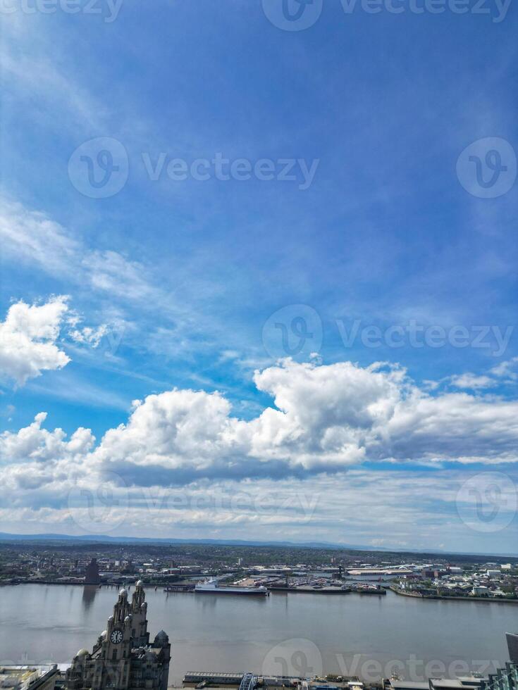 High Angle View of Historical and Modern British City Centre of Liverpool, Maritime city in northwest England, United Kingdom. Aerial Footage Was Captured with Drone's Camera on May 5th, 2024 photo