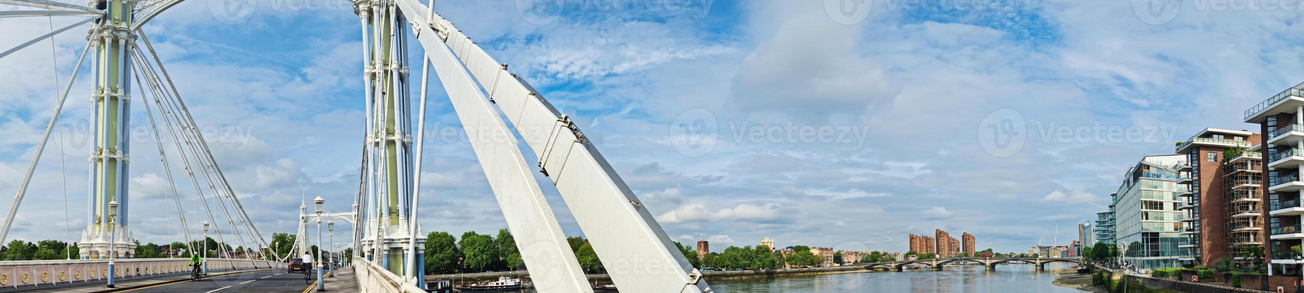 Wide Angle Panoramic Central Chelsea London city on river Thames Albert Bridge Road England United Kingdom. Low Angle High Resolution Image Was Captured on June 3rd, 2024 photo