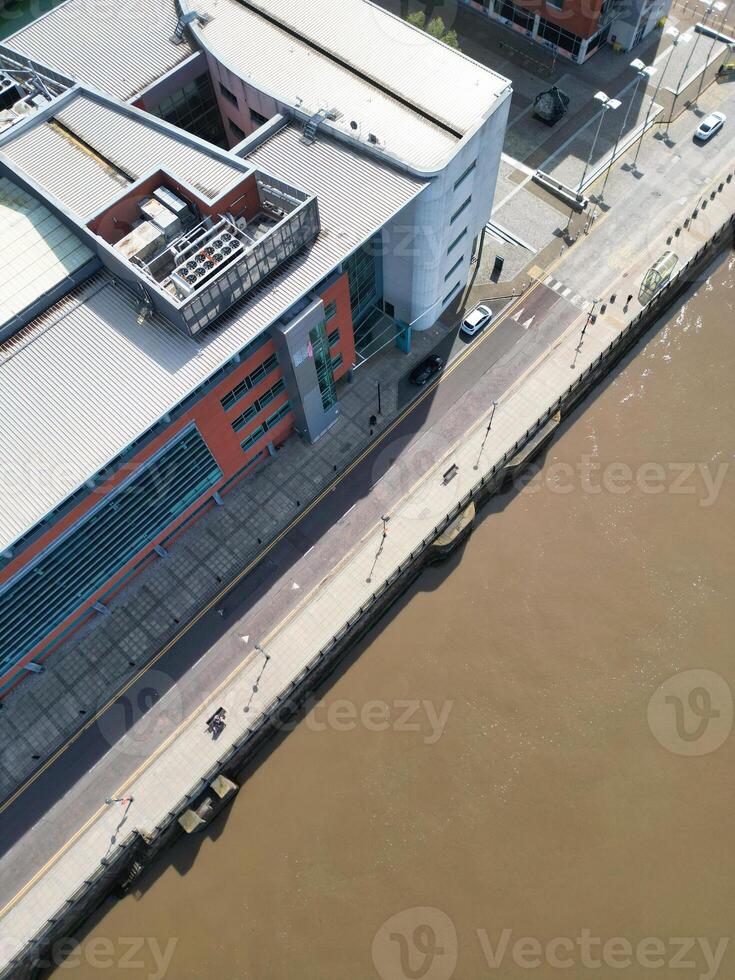 High Angle View of Historical and Modern British City Centre of Liverpool, Maritime city in northwest England, United Kingdom. Aerial Footage Was Captured with Drone's Camera on May 5th, 2024 photo
