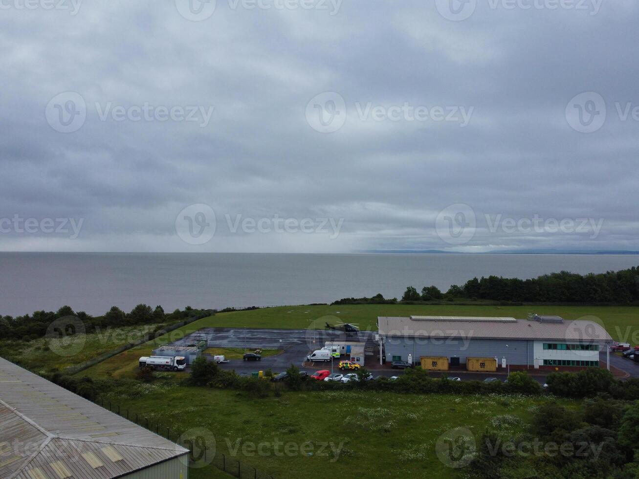 High Angle View of Cardiff City Centre and Buildings at Central Downtown and Near to Ocean Bay During Rainy and Cloudy Day of May 28th, 2024 photo