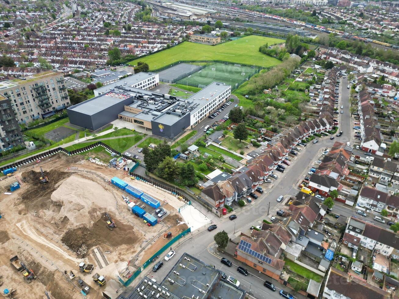 Aerial View of Downtown and Central Wembley London City of England Great Britain. High Angle Footage Was Captured with Drone's Camera from Medium High Altitude on April 17th, 2024 photo