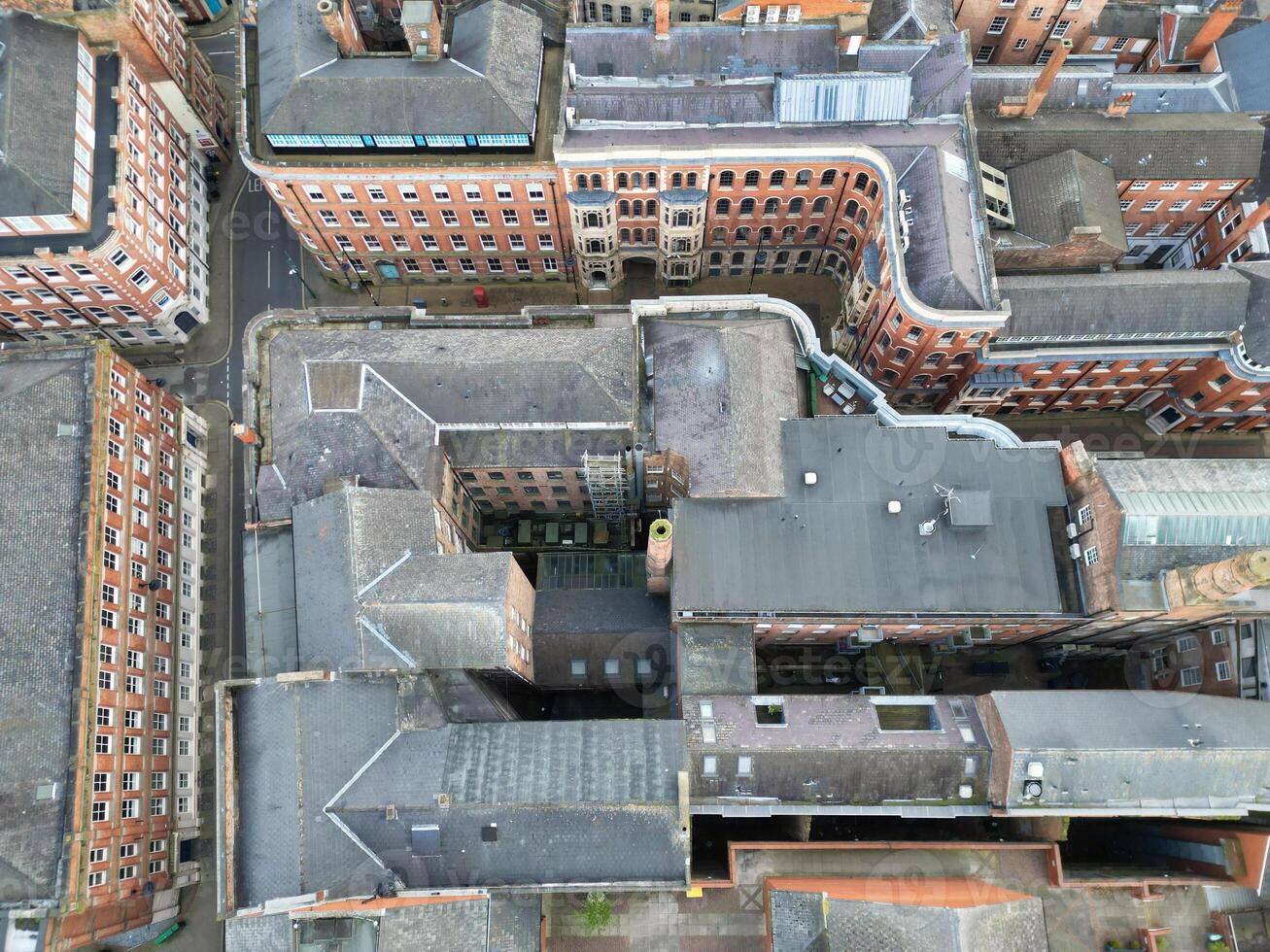 High Angle View of Buildings at Downtown Central Northampton City of East Midlands Region of England Great Britain. Aerial Footage Was Captured with Drone's Camera on April 26th, 2024 photo