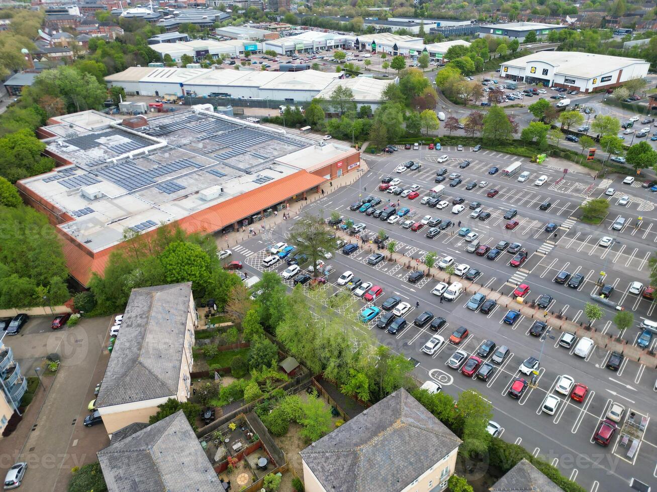 High Angle View of Buildings at Downtown Central Northampton City of East Midlands Region of England Great Britain. Aerial Footage Was Captured with Drone's Camera on April 26th, 2024 photo