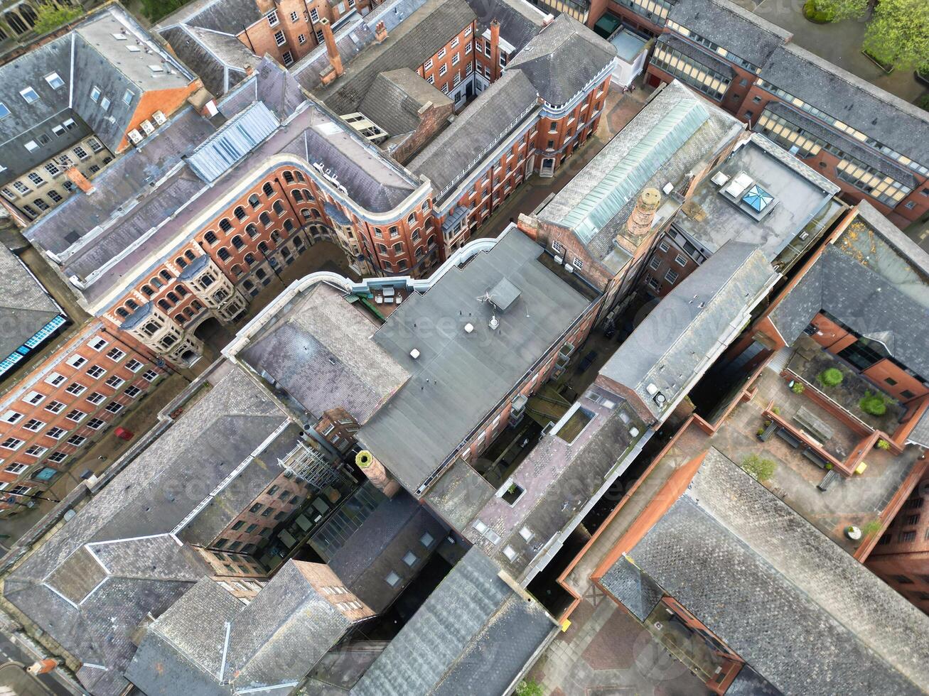 High Angle View of Buildings at Downtown Central Northampton City of East Midlands Region of England Great Britain. Aerial Footage Was Captured with Drone's Camera on April 26th, 2024 photo