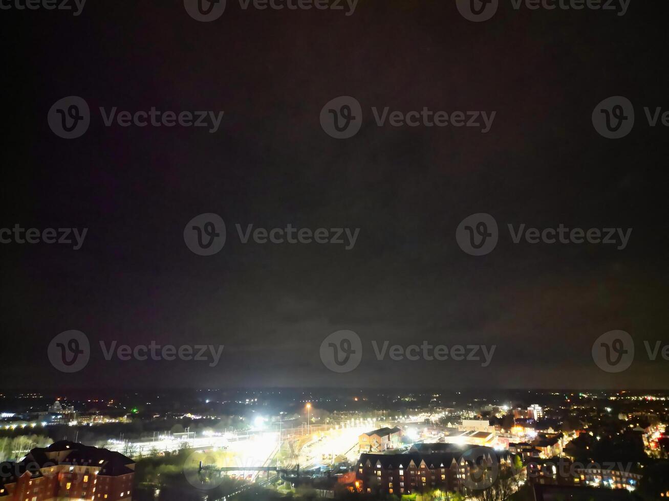 Illuminated Central Bedford City of England United Kingdom During Night. April 5th, 2024, High Angle Footage Was Captured after Sunset and Beginning of Night with Drone's Camera photo