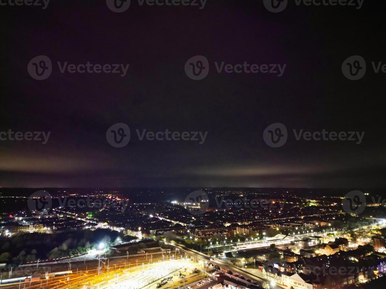 Illuminated Central Bedford City of England United Kingdom During Night. April 5th, 2024, High Angle Footage Was Captured after Sunset and Beginning of Night with Drone's Camera photo