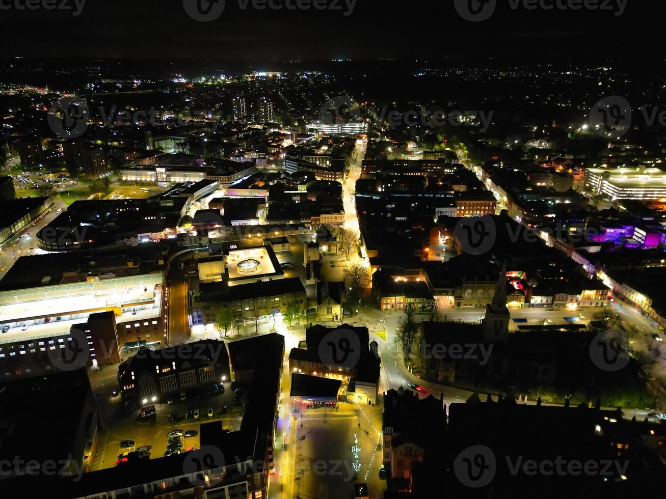 Illuminated Central Bedford City of England United Kingdom During Night. April 5th, 2024, High Angle Footage Was Captured after Sunset and Beginning of Night with Drone's Camera photo
