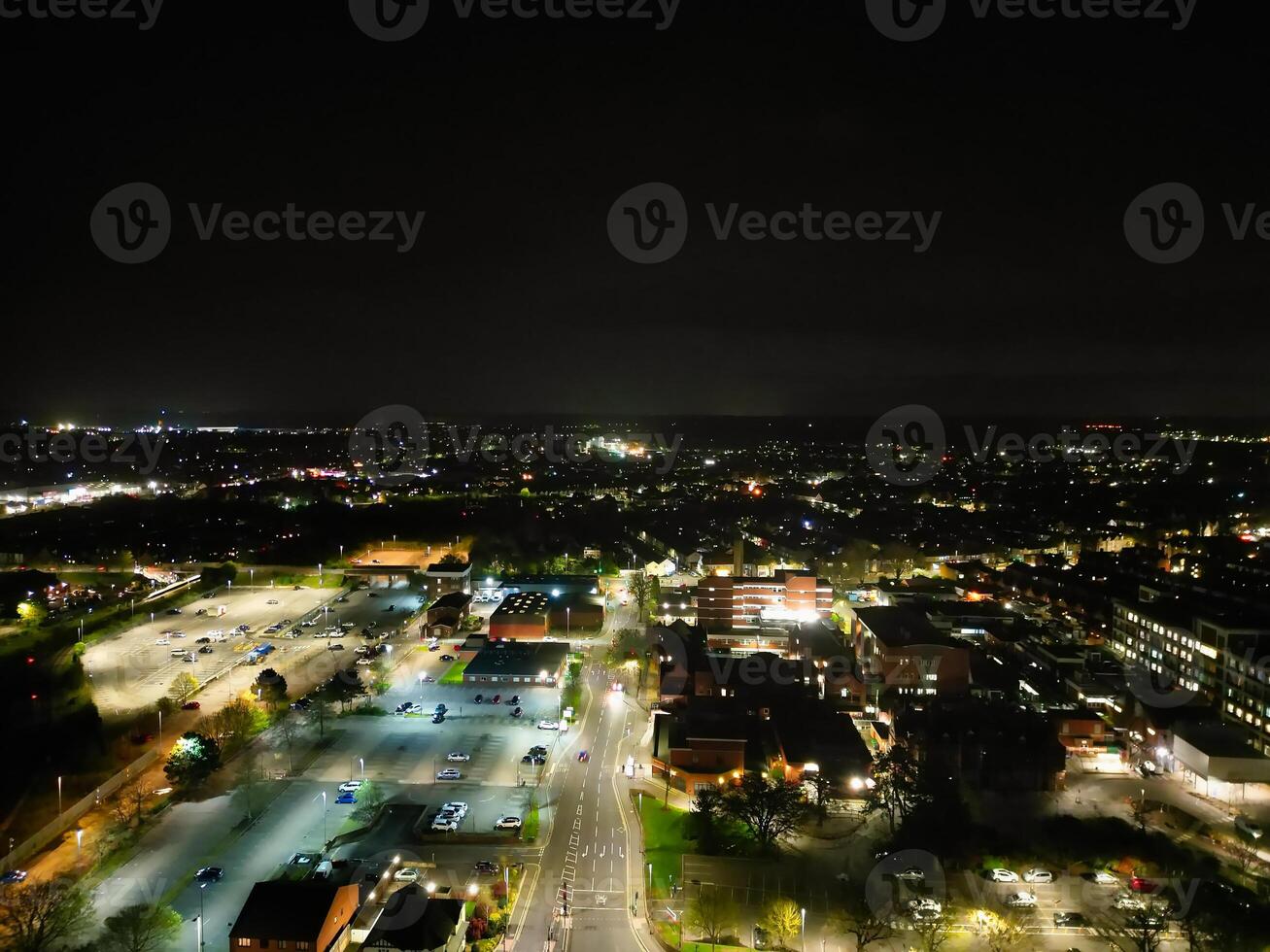 Illuminated Central Bedford City of England United Kingdom During Night. April 5th, 2024, High Angle Footage Was Captured after Sunset and Beginning of Night with Drone's Camera photo
